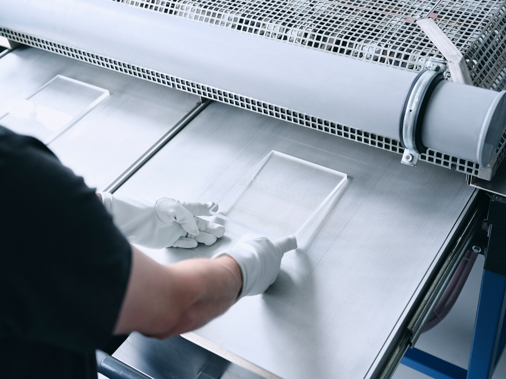 Prepared acrylic build-up on the press bed before laminating at Semadeni