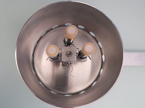 View from below into the weather protection hood with three passive samplers in place